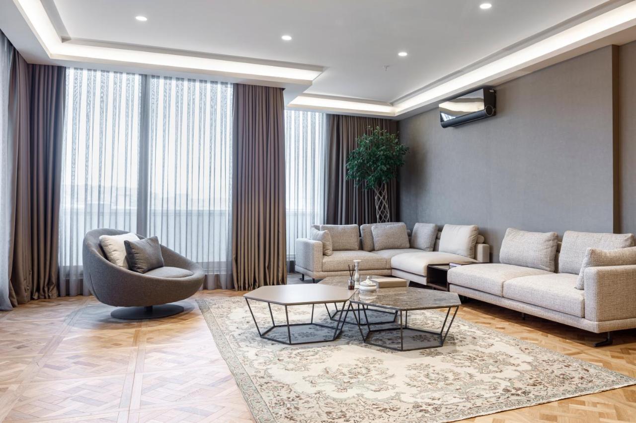איסטמבול Lazzoni Hotel מראה חיצוני תמונה A living room in a modern apartment